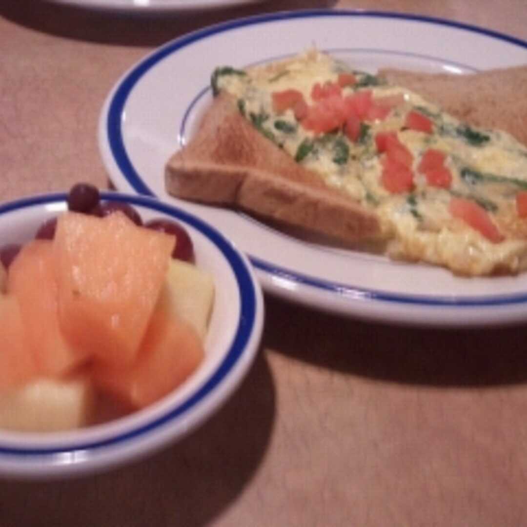 Bob Evans Veggie Omelet with fresh Fruit Dish & dry Wheat Toast with Smucker's Jelly