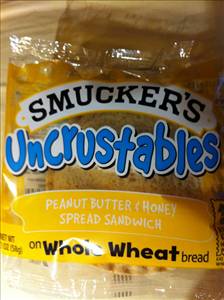 Smucker's Uncrustables Peanut Butter & Honey Spread Sandwich on Wheat Bread