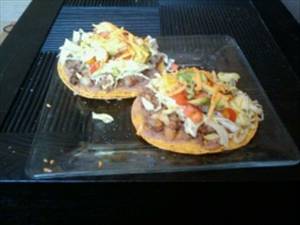 Taco or Tostada with Beans, Cheese, Meat, Lettuce, Tomato and Salsa