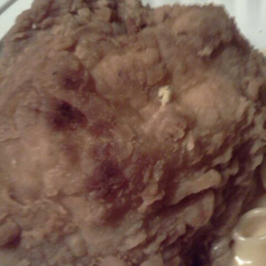 Baked or Fried Coated Chicken Thigh with Skin (Skin/Coating Eaten)