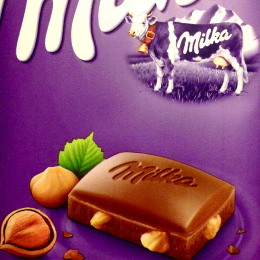 Milka Молочный Шоколад с Цельным Фундуком Калории и Пищевая Ценность