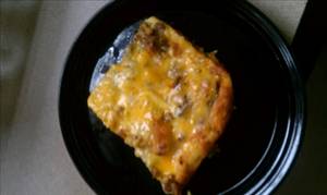 Egg Casserole with Bread, Cheese, Milk and Meat