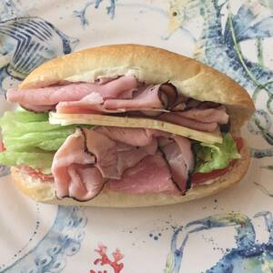 Ham and Cheese Sandwich with Lettuce and Spread