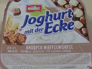 Müller Joghurt mit der Ecke Knusper Waffelwürfel