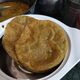 Fried Whole Wheat Puri or Poori Bread (Indian Puffed Bread)