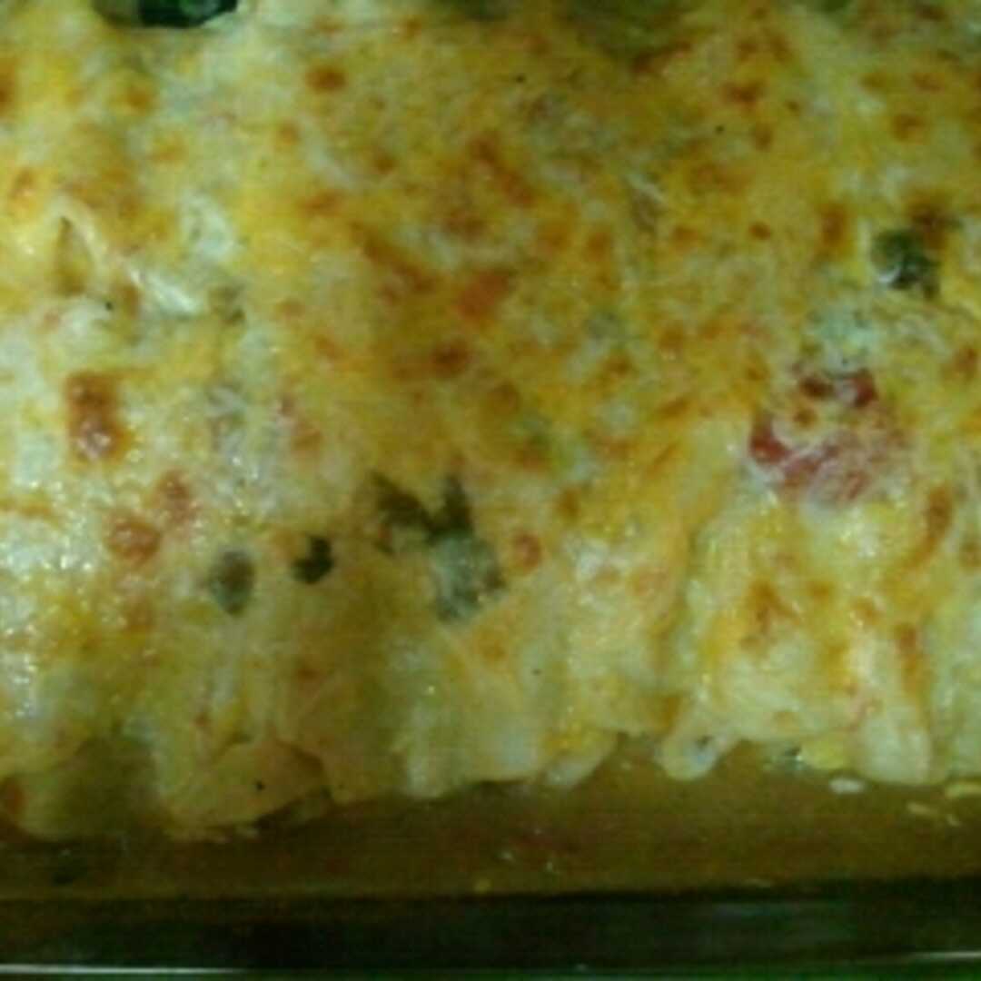 Enchilada with Chicken and Cheese in Tomato- Based Sauce