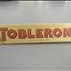 Toblerone Швейцарский Молочный Шоколад с Медово-Миндальной Нугой